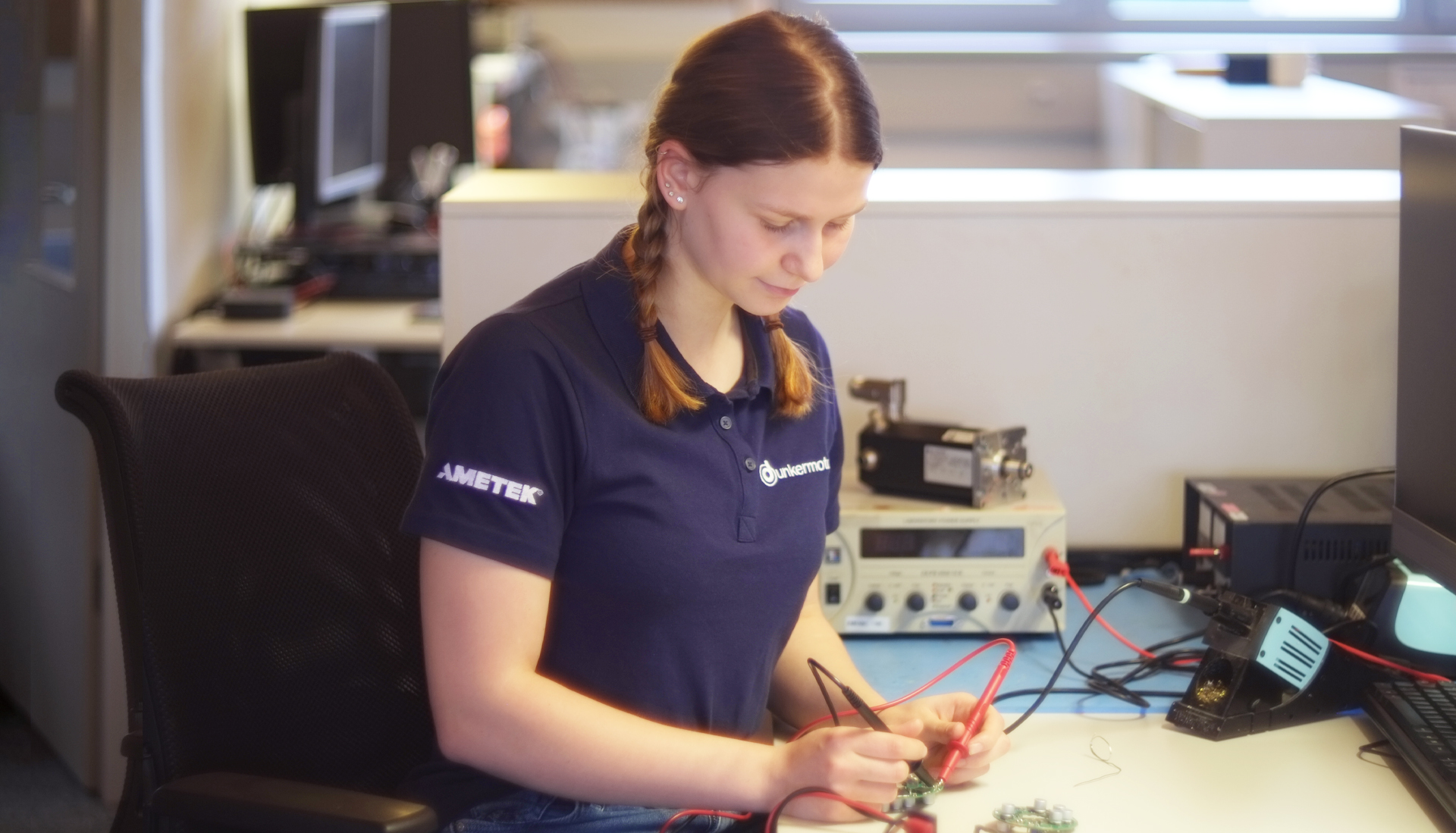 A woman soldering